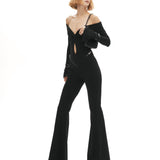 Siyah düşük omuzlu açık yaka ispanyol paça tulum