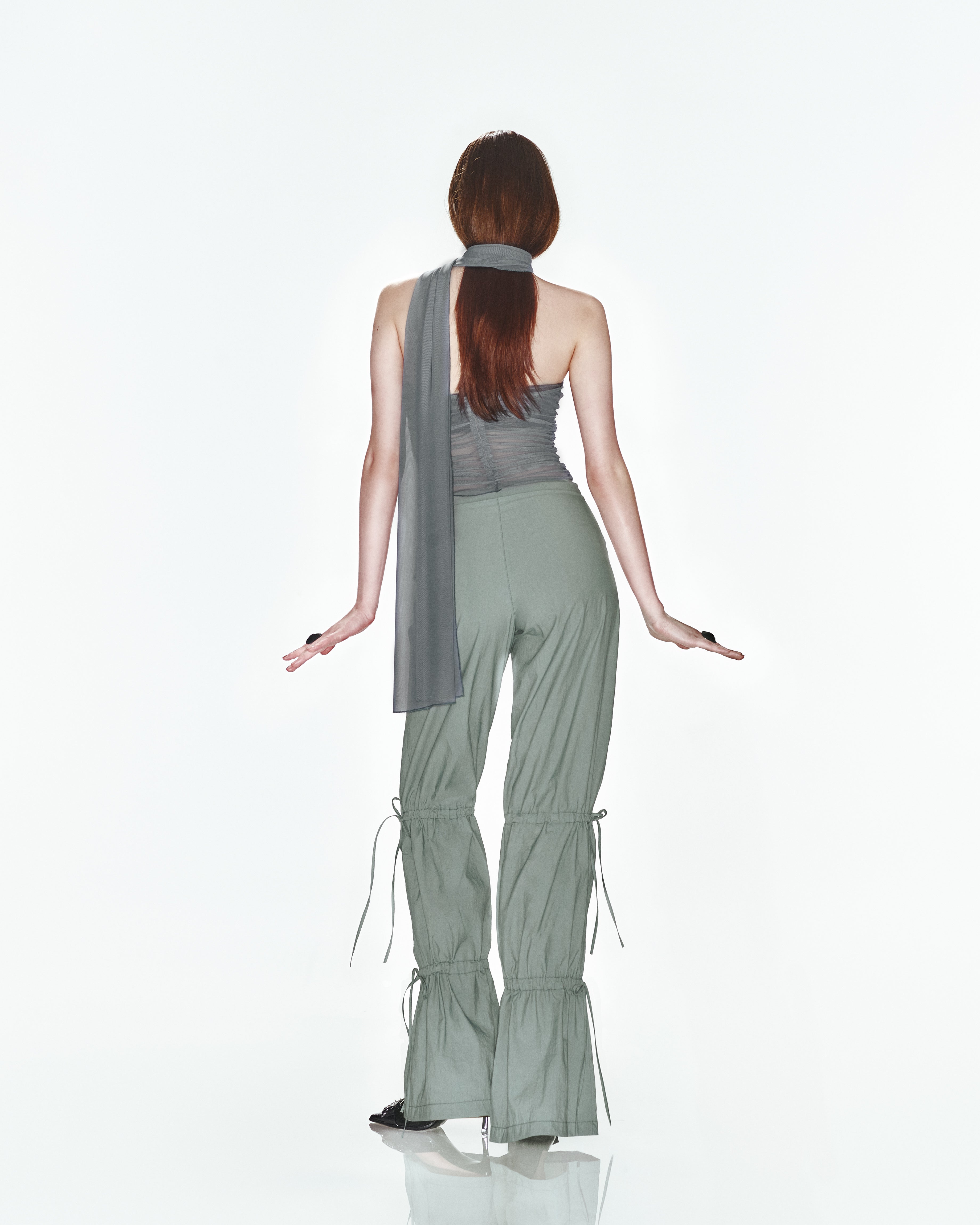 Yeşil ayarlanabilir bağcık büzgü detaylı paraşüt pantolon
