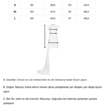 Beyaz yüksek yaka tokalı drapeli kuyruk detaylı mini elbise