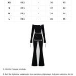Siyah düşük omuzlu açık yaka ispanyol paça tulum