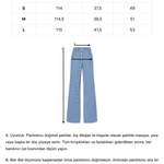 Mavi metal düğmeli yırtmaçlı bol pantolon