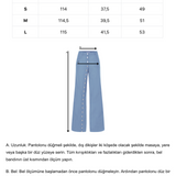 Mavi metal düğmeli yırtmaçlı bol pantolon