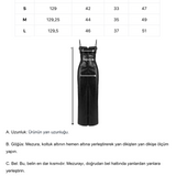 Khela parlak kumaş askılı derin yırtmaçlı maksi elbise