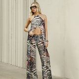WHO IS SHE PANTS IN ANIMAL PRINT