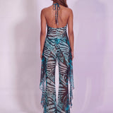 WHO IS SHE TOP IN GREEN ANIMAL PRINT