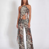 WHO IS SHE PANTS IN ANIMAL PRINT